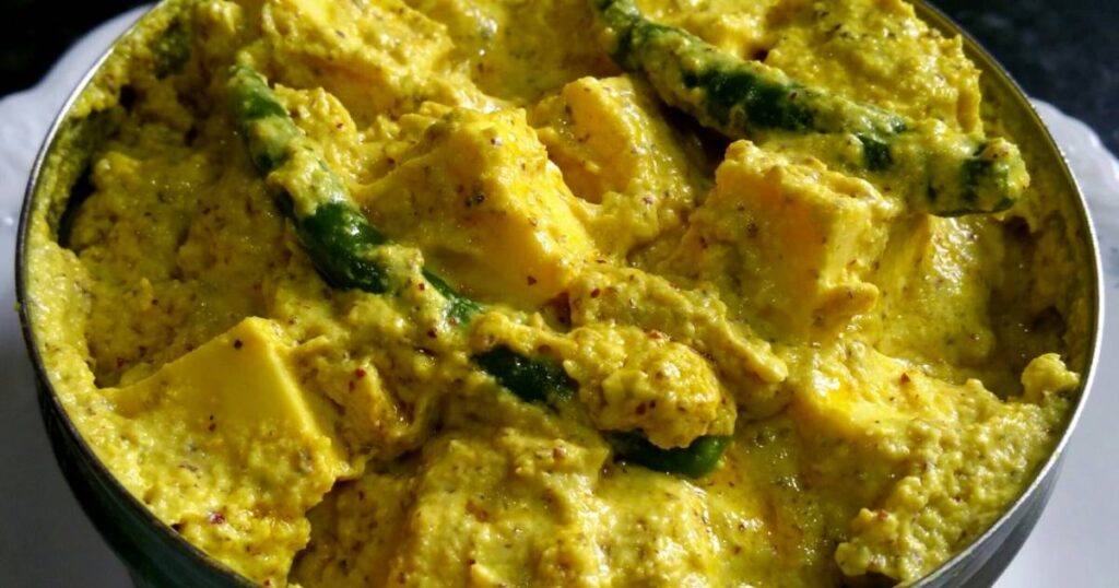 Paneer Bhapa in a bowl – a flavorful Bengali steamed paneer dish with mustard and coconut, ideal for those seeking new recipes for dinner